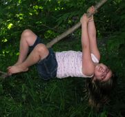 2009_05_29 Mason Michigan Granddaughter Hazel showing off her tree climbing skills (cropped)